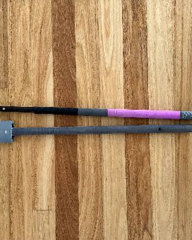 Two piece carbon boom for slick wing
