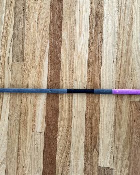 Two piece carbon boom for slick wing