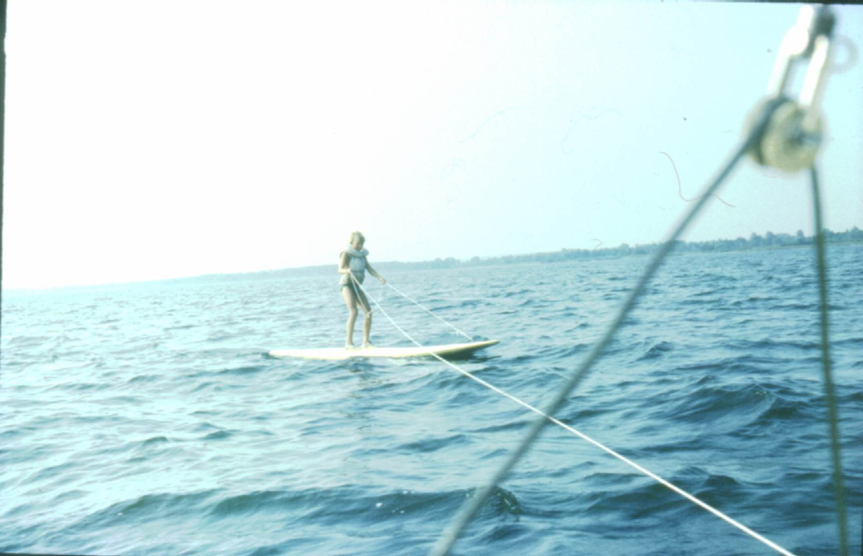 1980 Marek being in tow with Windsurf board behind a sailboat