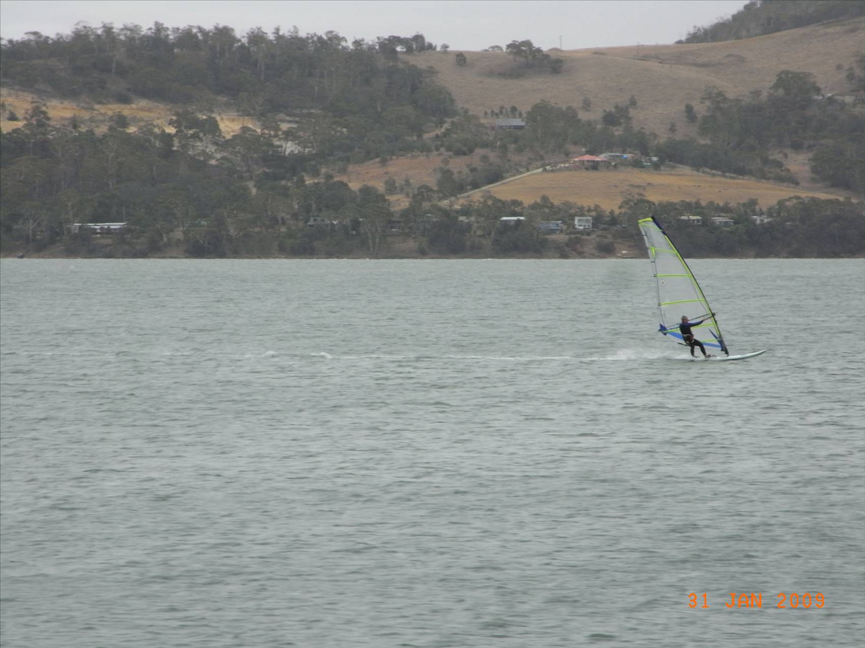 Lone sailer on causway near Sorrel, Tassie
