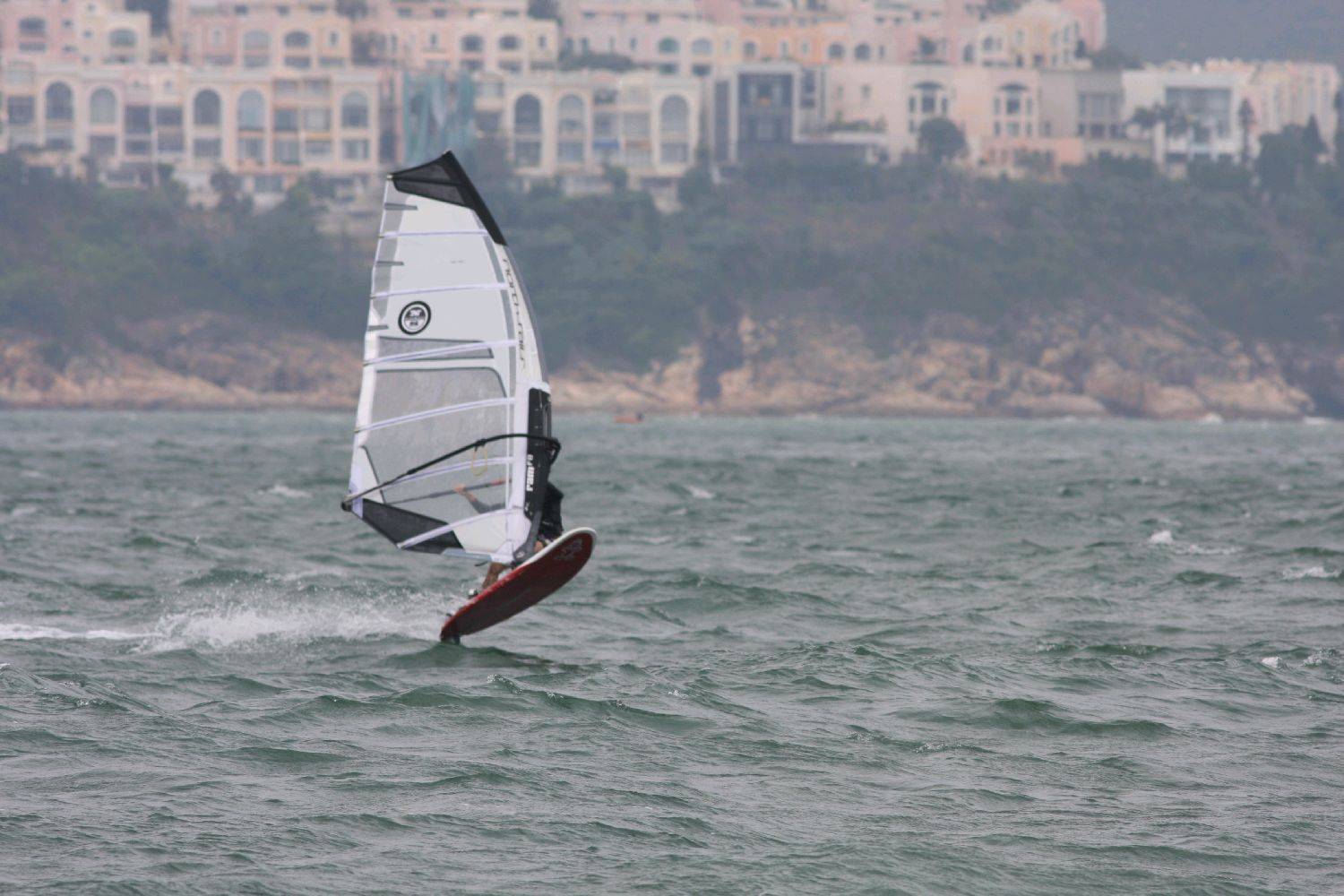 Wind gusting at 35knots, pretty tough on my 5.8m with my 55kgs.....