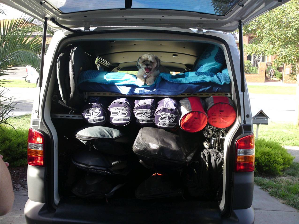 Back of van, hard to see but has 6x boards in board bags.