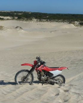 bike bogged in sand - 1