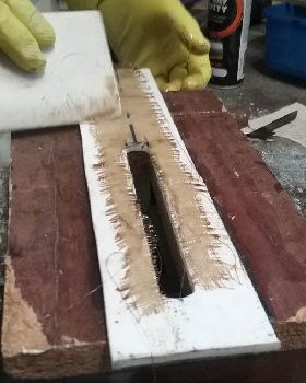 under cloth on jig