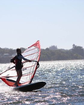 kid windsurfing