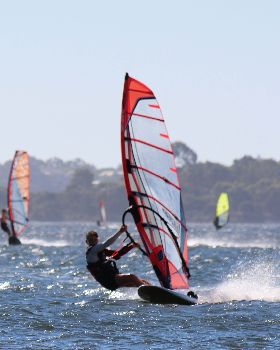 kid windsurfing