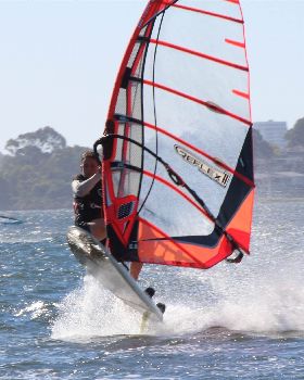kid windsurfing