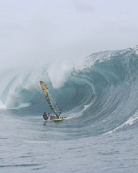 Tackling Teahupoo on a windsurfer
