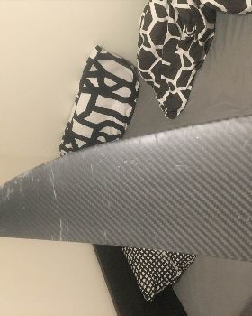 scratched front wing