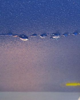 water coming out through crack