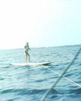 1980 Marek being in tow with Windsurf board behind a sailboat