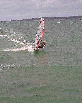 Testing the 2010 95L OES twin fin for speed and turning on flat water next to a single fin
