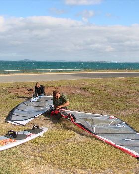 Testing the 2010 95L OES twin fin for speed and turning on flat water next to a single fin