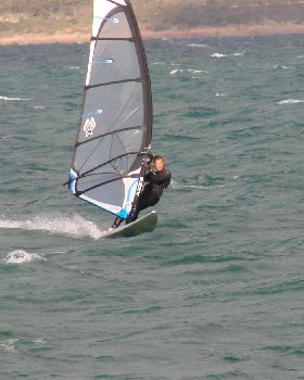 Testing the 2010 95L OES twin fin for speed and turning on flat water next to a single fin