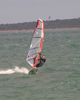 Testing the 2010 95L OES twin fin for speed and turning on flat water next to a single fin