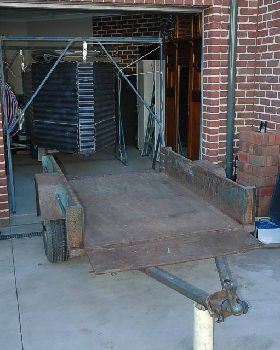 Windsurfing Trailer Box, suspended by lifting frames while trailer is on other duties
