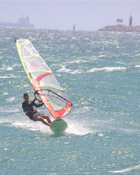 competitors battling 30 knots at the South beach slalom event.