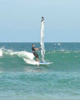 Getting some good waves and getting smashed on my SUP
