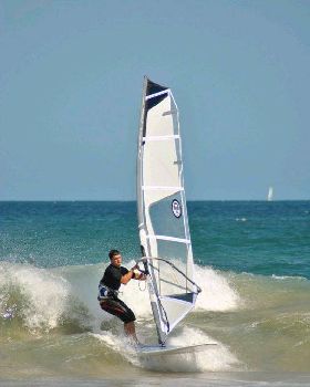 Getting some good waves and getting smashed on my SUP