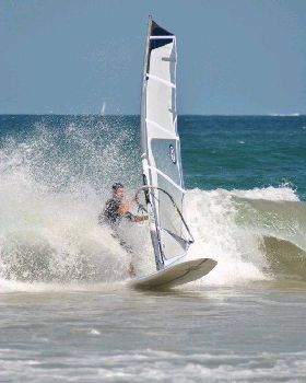 Getting some good waves and getting smashed on my SUP