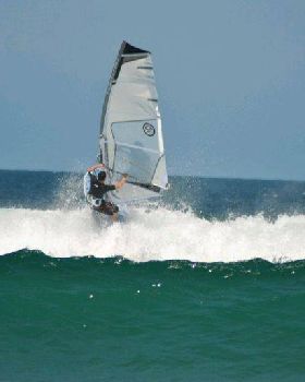 Getting some good waves and getting smashed on my SUP