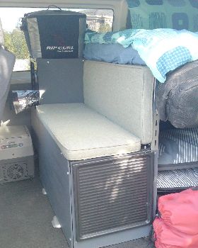 Bit washed out photo of the bench seat and fridge