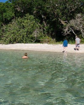 Swimming the isolated back beach