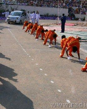 46. Swami's car being welcomed in an unusual way by the Primary School boys when He arrives for the 