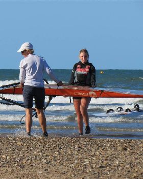 Some of the sailors coming in from a hard day on the water
