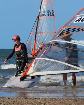 Some of the sailors coming in from a hard day on the water