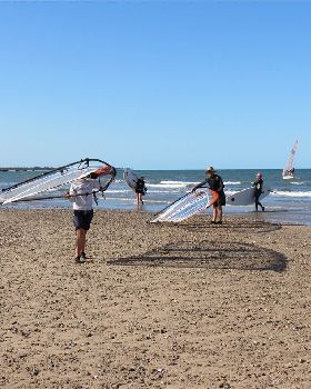 Some of the sailors coming in from a hard day on the water