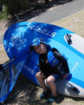 Big Board, Small Sail, Even Smaller Sailor