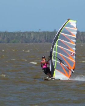 lOCAL sailor Kellie Tusler on an NXS speed slalom board with 5m Hotsail GPS  at lake cootharaba