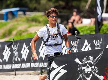 Kai Lenny winning the Naish Maliko race - Stand Up Paddle News