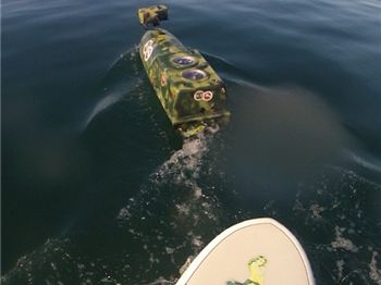 Stand Up Paddler discovers camouflage drone while paddling - Stand Up Paddle News